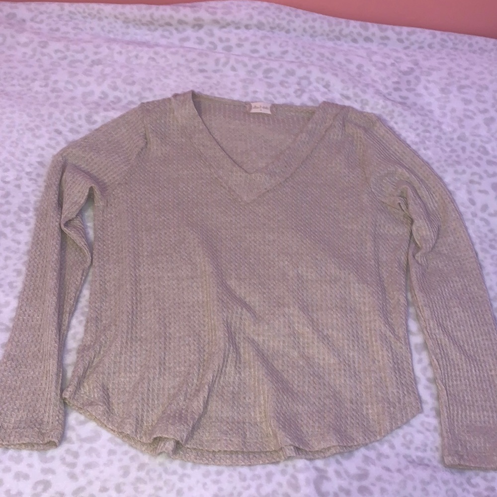 From altered state color is tan size is M